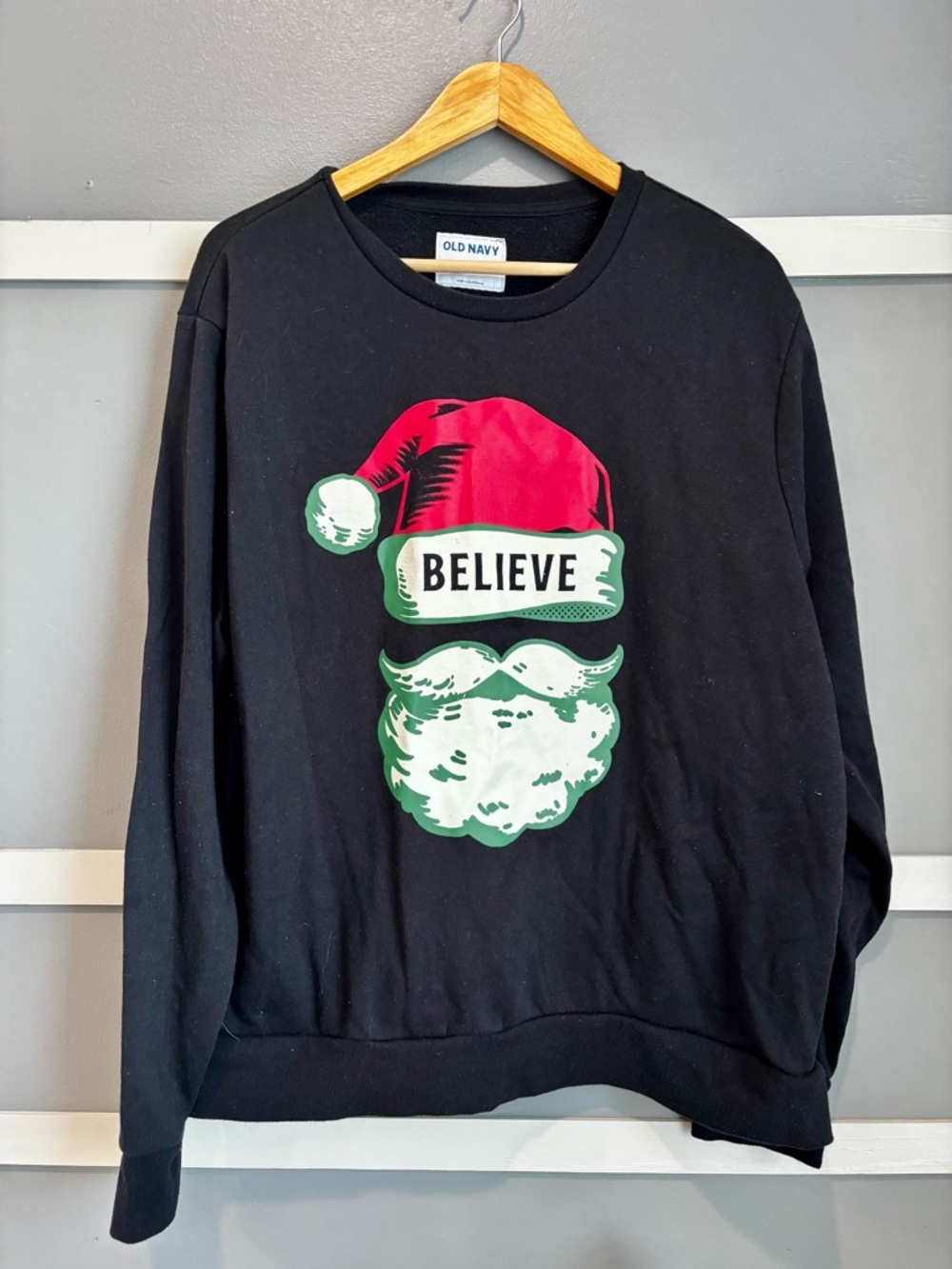 Old Navy Black Crewneck Sweater with Red & Green Santa Graphic